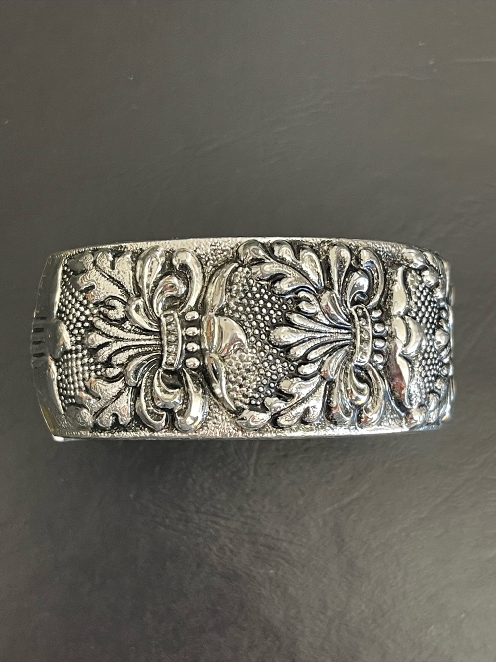 Vintage Ornate Silver-Tone Floral bangle bracelet.
